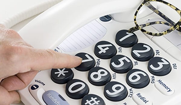 An image of a telephone with large numbers on the buttons for customers with impaired vision or similar needs for their residential phone service.